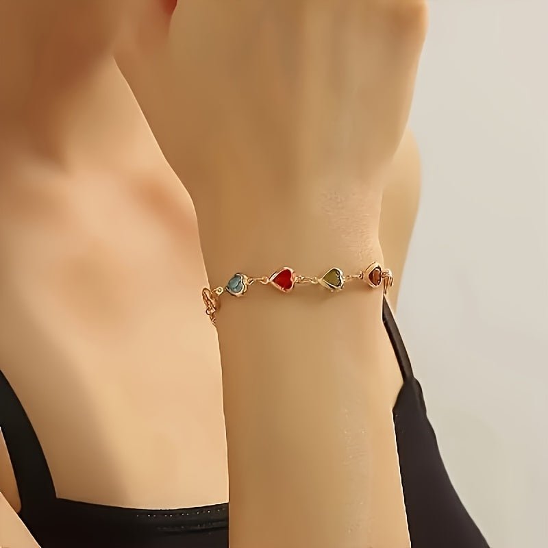 HEART-SHAPED GOLD BRACELET - Harry & Olivia Birmingham